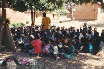 Class under the trees at St. Denis Primary School